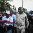 Tanzania opposition leader Freeman Mbowe (C) arrived at his party's headquarters after being released from prison in Dar es Salaam