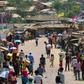 Rohingya refugees gather in a market area of the Kutupalong refugee camp in Bangladesh on March 24, 2020 -- "social distancing" to protect against the coronavirus pandemic is "virtually impossible", an NGO said