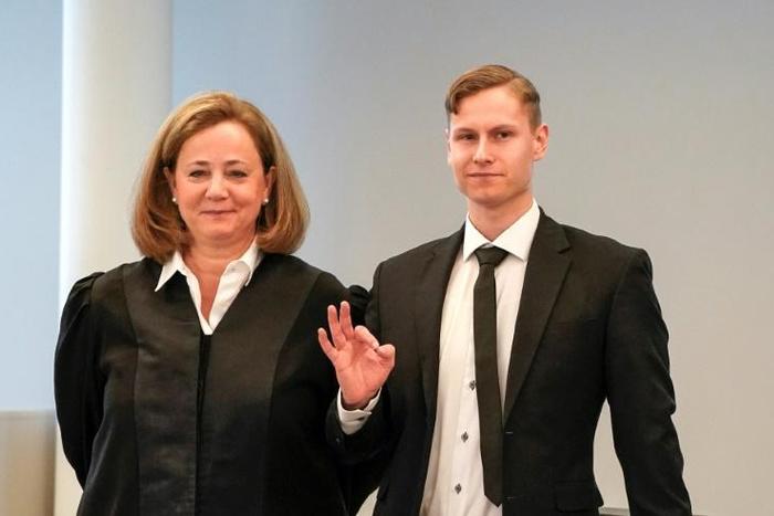 Norwegian Philip Manshaus (right), with his lawyer (left) pleaded not guilty to opening fire at a mosque near Oslo last year