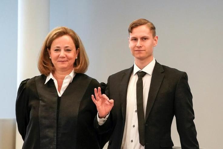 Norwegian Philip Manshaus (right), with his lawyer (left) pleaded not guilty to opening fire at a mosque near Oslo last year