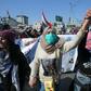 Iraqi students during an anti-government demonstration in Baghdad's Tahrir square in February, a month before the spread of coronavirus escalated into a major global crisis
