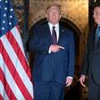 US President Donald Trump speaks with Brazilian President Jair Bolsonaro during a dinner at Mar-a-Lago in Palm Beach, Florida, US in March
