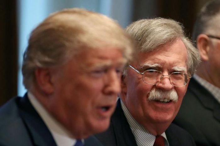 John Bolton, then national security advisor, listens to US President Donald Trump in an April 2018 meeting in the Cabinet Room