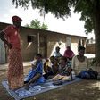 The family of Bakary Sangare, one of the latest victims, gathers in a Fana courtyard