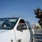 A motorist is checked by security at a checkpoint in the Afghan capital at the start of the Eid al-Fitr holiday