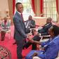 Muhoho Kenyatta, President Uhuru Kenyatta's son greets Uganda's First Lady Janet Museveni during a past state visit at State House Nairobi
