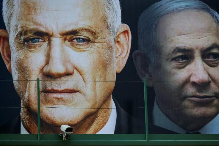 Israel'a parliament speaker Benny Gantz and Prime Minister Benjamin Netanyahu, bitter rivals through three elections in less than a year, have pledged to form an emergency unity government to tackle the coronavirus but a deal has proved elusive