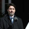 Canadian Prime Minister Justin Trudeau (pictured March 16, 2020) also urged all Canadians living abroad to "come home"