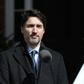 Canadian Prime Minister Justin Trudeau (pictured March 16, 2020) also urged all Canadians living abroad to "come home"