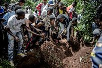 Family and friends during the burial of 13-year-old Yassin Moyo who was shot dead by police while at the balcony of his parents' house