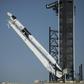 SpaceX's Falcon 9 rocket is raised into a vertical position on the launch pad ahead of the crewed mission to the International Space Station