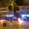 Lebanese anti-government protesters burn tyres amid overnight clashes with security forces in the northern city of Tripoli