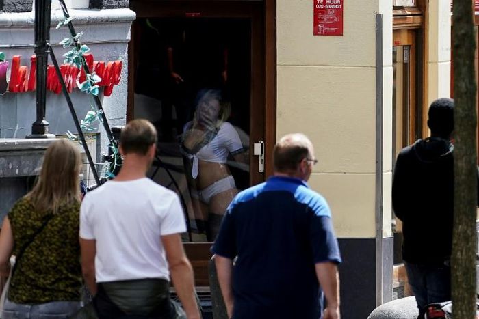 Amsterdam's famous red light district on Wednesday after it reopened its doors