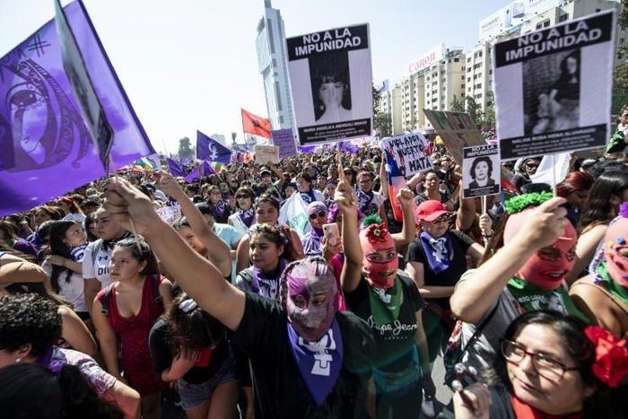 Women demonstrate during a march on International Women's Day in Santiago, Chile