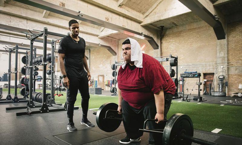 Maynor doing a strength workout with his trainer David Carson at On Your Mark gym in Chicago.