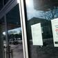 A "closed" sign is viewed on the door of the Tenley/Friendship DC Public Library on March 16, 2020, in Washington, DC