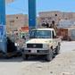 Yemeni pro-government fighters gather at a petrol station on April 10 in the coastal town of Shihr, in the southern Hadramawt province where the country's first case of coronavirus was reported
