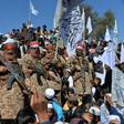 Afghan Taliban militants and villagers attend a gathering as they celebrate the peace deal and their victory in the Afghan conflict on US in Afghanistan, in Alingar district of Laghman Province on March 2, 2020