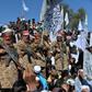Afghan Taliban militants and villagers attend a gathering as they celebrate the peace deal and their victory in the Afghan conflict on US in Afghanistan, in Alingar district of Laghman Province on March 2, 2020
