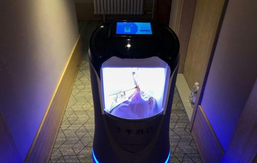 This robot is capable of taking elevators and navigating hallways to deliver food to hotel guests