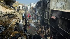 The PIa plane was close to landing when it came down among houses, sparking an explosion and killing several people on the ground
