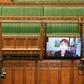 A handout photograph from the UK Parliament shows Green Party MP Caroline Lucas speaking via video link during Prime Minister's Questions in the House of Commons in London.