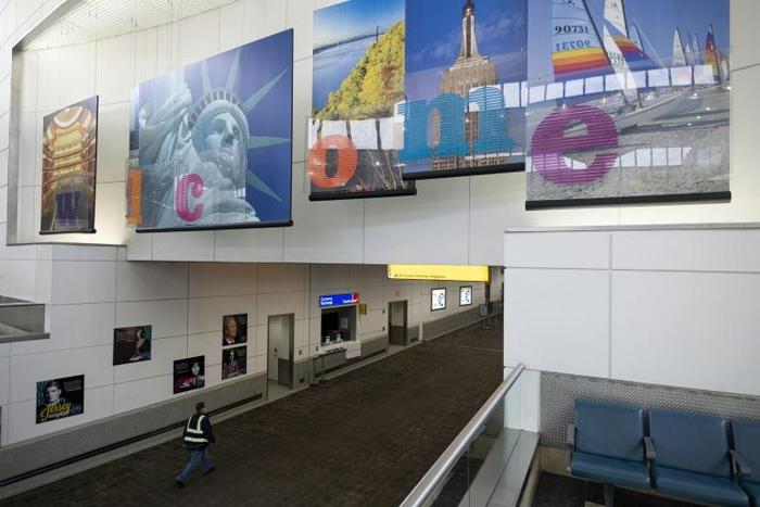 Amid an unprecedented slump in travel, online booking group Expedia said it was raising cash and cutting pay to weather the pandemic-induced crisis
