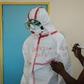Protection: A doctor gets suited up for visiting a quarantine ward at Kenyatta National Hospital in Nairobi