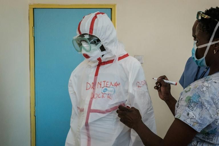 File image of a doctor gearing up to enter the KNH isolation ward