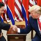 North Korean leader Kim Jong Un (L) and US President Donald Trump shake hands on June 30, 2019, during a meeting on the south side of the Military Demarcation Line that divides North and South Korea