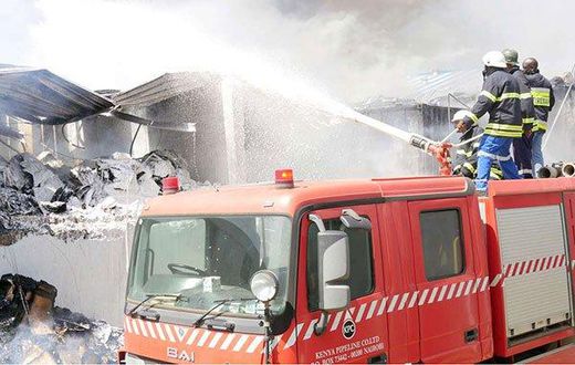 Firefighters at Metro Plastics Kenya Ltd in Industrial Area, Nairobi on March 14, 2020. Police are investigating claims that employees at the factory were allegedly locked up overnight by the employer