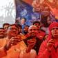 Members of All India Hindu Mahasabha staged fire rituals and drank cow urine in New Delhi Saturday to fight COVID-19