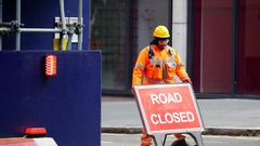 Britain's economy shrank two percent in the first three months of the year, rocked by the fallout from the coronavirus pandemic, official data shows