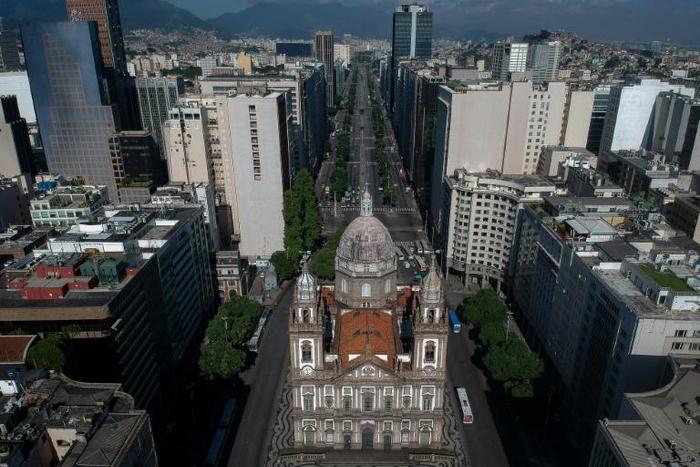 Aerial view of the Candelaria church and the empty Presidente Vargas avenue in downtown Rio de Janeiro, Brazil on March 25, 2020, during the outbreak of the new coronavirus