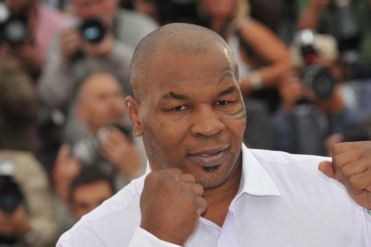 Watch Mike Tyson Hammer His Trainer in New Video