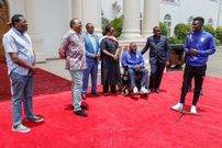 President Uhuru Kenyatta handover a brand new 51-seater Bus to AFC Leopards at State House (Photos)