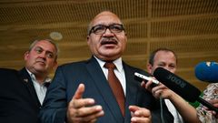 Papua New Guinea's former prime minister Peter O'Neill (C), pictured here in November 2018, has been arrested