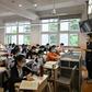 Students wear face masks in a classroom as school reopens in Shanghai