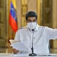 Venezuelan President Nicolas Maduro reads a televised message on May 9, 2020