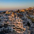 Sunset in the town of Oia on the island of Santorini as Greece prepares for the return of tourists