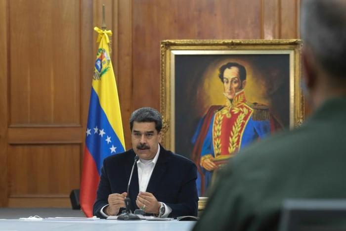 Venezuela's President Nicolas Maduro meeting with members of the military in Caracas on May 4, 2020 after an alleged "invasion" by  mercenaries