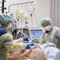 Medical staff take care of a Covid-19 patient in the intensive care unit at the community hospital in Magdeburg, eastern Germany