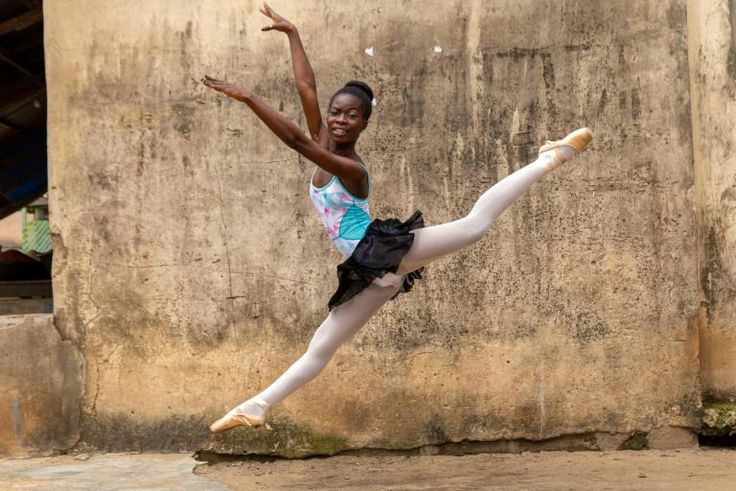 Dancing in the streets: A ballet student of the Leap of Dance Academy in a poor district of Nigerian megacity Lagos