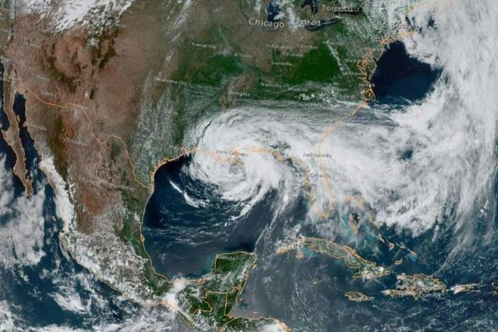 This satellite image obtained from NOAA/RAMMB, shows Tropical Storm Cristobal just south of New Orleans at 19:50 UTC on June 7, 2020, as it moves northward at 12 miles per hour (19 kph)