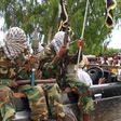 File image of Al Shabaab militants The terror group is said to have attacked Camp Simba base in Lamu