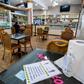 Hand sanitizer available for clients and tables set apart are part of the rules for reopening in Milan