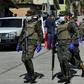 Soldiers assist health personnel in Tegucigalpa, Honduras on March 17, 2020 after two new cases of the new coronavirus were confirmed