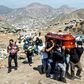 Relatives carry the coffin of a suspected COVID-19 victim at the Nueva Esperanza cemetery, one of the largest in Latin America, in the southern outskirts of Lima -- Peru has lost at least 170 police officers to the disease