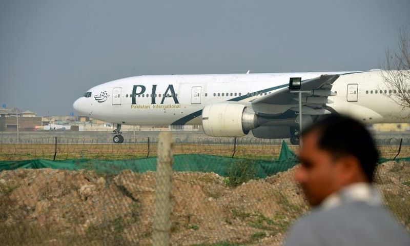 A file photo from 2016 shows a Pakistan International Airlines plane in Islamabad