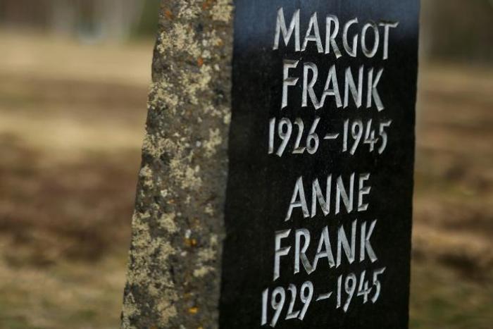 A memorial stone for the young diarist Anne Frank and her sister on the grounds of the former concentration camp Bergen-Belsen